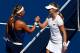 NEW YORK, NY - SEPTEMBER 03: Ekaterina Makarova (R) of Russia shakes hands Victoria Azarenka (L) of Belarus after their women's singles quarterfinal match on Day Ten of the 2014 US Open at the USTA Billie Jean King National Tennis Center on September 3,