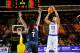 BILBAO, SPAIN - SEPTEMBER 3: Eulis Baez #13 of the Dominican Republic Basketball Men's National Team shoots the ball during the game against Kenneth Faried #7 of the USA Basketball Men's National Team during the 2014 FIBA World Cup at Bizkaia Arena in Bil