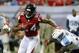 Aug 23, 2014; Atlanta, GA, USA; Atlanta Falcons wide receiver Roddy White (84) makes a move on Tennessee Titans strong safety Bernard Pollard (31) after a catch in the first quarter of their game at the Georgia Dome. The Titans won 24-17. Mandatory Credit