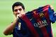 BARCELONA, SPAIN - AUGUST 19: Luis Suarez of FC Barcelona holds a FC Barcelona shirt during his presentation as new FC Barcelona player at Camp Nou on August 19, 2014 in Barcelona, Spain. (Photo by David Ramos/Getty Images)