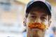 SAO PAULO, BRAZIL - NOVEMBER 26: Sebastian Vettel of Germany and Red Bull Racing is seen wearing a false moustache as he celebrates breaking Nigel Mansells record after securing pole position for the fifteenth time this season following qualifying for th