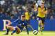 LEICESTER, ENGLAND - AUGUST 31: Calum Chambers of Arsenal goes past David Nugent of Leicester City during the Barclays Premier League match between Leicester City and Arsenal at The King Power Stadium on August 31, 2014 in Leicester, England. (Photo by