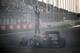 NOIDA, INDIA - OCTOBER 27: Race winner and 2013 Formula One World Champion Sebastian Vettel of Germany and Infiniti Red Bull Racing celebrates in front of the crowd by doing donuts on the main straight following the Indian Formula One Grand Prix at Buddh