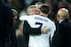 MADRID, SPAIN - FEBRUARY 13: Cristiano Ronaldo (R) of Real Madrid embraces Sir Alex Ferguson, manager of Manchester United, at the end of the UEFA Champions League Round of 16 first leg match between Real Madrid and Manchester United at Estadio Santiago