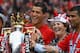 MANCHESTER, ENGLAND - MAY 16: Cristiano Ronaldo of Manchester United celebrates winning the Barclays Premier League trophy with his mother, Dolores Aveiro after the Barclays Premier League match between Manchester United and Arsenal at Old Trafford on Ma