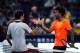 SHANGHAI, CHINA - OCTOBER 10: Gael Monfils (R) of France shake hands with Roger Federer of Switzerland after his win game during day four of the Shanghai Rolex Masters at the Qi Zhong Tennis Center on October 9, 2013 in Shanghai, China. (Photo by Lintao