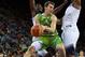 LAS PALMAS, GRAN CANARIA, SPAIN - AUGUST 26: Goran Dragic #11 of the Slovenia Basketball Men's National Team passes against the USA Basketball Men's National Team on August 26, 2014 at Gran Canaria Arena in Las Palmas, Gran Canaria, Spain. NOTE TO USER: U