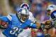 DETROIT, MI - DECEMBER 22: Joique Bell #35 of the Detroit Lions runs for a short gain during the second quarter of the game against the New York Giants at Ford Field on December 22, 2013 in Detroit, Michigan. (Photo by Leon Halip/Getty Images)