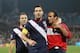 RUSTENBURG, SOUTH AFRICA - JUNE 12: Carlos Bocanegra of the United States (C) celebrates with Steve Cherundolo (L) and Landon Donovan (R) at the final whistle during the 2010 FIFA World Cup South Africa Group C match between England and USA at the Royal B