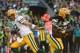 September 4, 2014; Seattle, WA, USA; Green Bay Packers running back Eddie Lacy (27, right) receives the hand off from quarterback Aaron Rodgers (12) against the Seattle Seahawks during the first quarter at CenturyLink Field. Mandatory Credit: Kyle Terada-