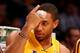 LOS ANGELES, CA - NOVEMBER 01: Xavier Henry #7 of the Los Angeles Lakers gestures to teammates on the bench after he receives a bandage for a cut on the forehead in the game with the San Antonio Spurs at Staples Center on November 1, 2013 in Los Angeles,