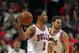 CHICAGO, IL - OCTOBER 31: Derrick Rose #1 of the Chicago Bulls leaps to pass against the Cleveland Cavaliers at the United Center on October 31, 2014 in Chicago, Illinois. NOTE TO USER: User expressly acknowledges and agrees that, by downloading and or us