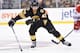 BOSTON, MA - NOVEMBER 15 : Matt Bartkowski #43 of the Boston Bruins skates against the Carolina Hurricanes at the TD Garden on November 15, 2014 in Boston, Massachusetts. (Photo by Brian Babineau/NHLI via Getty Images)
