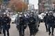Nov 30, 2014; St. Louis, MO, USA; Police in riot gear respond to Michael Brown shooting protesters outside of the Edward Jones Dome during the NFL game between the Oakland Raiders and St. Louis Rams. Mandatory Credit: Kirby Lee-USA TODAY Sports
