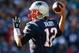 FOXBORO, MA - DECEMBER 14: Tom Brady #12 of the New England Patriots passes the ball during the first quarter against the Miami Dolphins at Gillette Stadium on December 14, 2014 in Foxboro, Massachusetts. (Photo by Jared Wickerham/Getty Images)