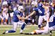 INDIANAPOLIS, IN - JANUARY 04: Holder Pat McAfee #1 and place kicker kicker Adam Vinatieri of the Indianapolis Colts celebrate Vinatieri's field goal in the first half against the Cincinnati Bengals during their AFC Wild Card game at Lucas Oil Stadium on
