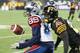 HAMILTON, ON - NOVEMBER 8: Duron Carter #89 of the Montreal Alouettes drops a ball against the Hamilton Tiger-Cats in a CFL football game at Tim Hortons Field on November 8, 2014 in London, Ontario, Canada. The Tiger-Cats defeated the Alouettes 29-15. (P