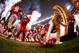 ARLINGTON, TX - JANUARY 12: A Ohio State Buckeyes cheerleader falls as the Buckeyes run out to the field before the College Football Playoff National Championship Game at AT&T Stadium on January 12, 2015 in Arlington, Texas. (Photo by Tom Pennington/Get