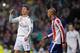 MADRID, SPAIN - JANUARY 15: Cristiano Ronaldo of Real Madrid reacts beside Joao Miranda of Club Atletico de Madrid during the Copa del Rey Round of 16, Second leg match between Real Madrid and Atletico de Madrid at Estadio Santiago Bernabeu on January 15