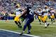 SEATTLE, WA - JANUARY 18: Marshawn Lynch #24 of the Seattle Seahawks runs the ball in for a touchdown during the fourth quarter of the 2015 NFC Championship game against the Green Bay Packers at CenturyLink Field on January 18, 2015 in Seattle, Washington