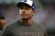 Sep 7, 2014; Arlington, TX, USA; Dallas Cowboys practice squad player Michael Sam watches warm ups before the game against the San Francisco 49ers at AT&T Stadium. Mandatory Credit: Tim Heitman-USA TODAY Sports