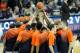 CHARLOTTESVILLE, VA - FEBRUARY 22: The Virginia Cavaliers huddle before a college basketball game against the Florida State Seminoles at John Paul Jones Arena on February 22, 2015 in Charlottesville, Virginia. The cavaliers won 51-41. (Photo by Mitchel