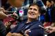 Nov 22, 2014; Houston, TX, USA; Dallas Mavericks owner Mark Cuban is interviewed before the game between the Houston Rockets and the Mavericks at the Toyota Center. Mandatory Credit: Jerome Miron-USA TODAY Sports