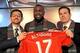 Jan 16, 2015; Toronto, ON, Canada; Toronto FC striker Jozy Altidore is presented with his Toronto FC team jersey by club general manager Tim Bezbatchenko (left) and head coach Greg Vanney (right) during a media conference at Air Canada Centre. Mandatory