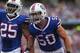 ORCHARD PARK, NY - OCTOBER 13: Kiko Alonso #50 of the Buffalo Bills and Da'Norris Searcy #25 celebrate after stopping the Cincinnati Bengals during NFL game action at Ralph Wilson Stadium on October 13, 2013 in Orchard Park, New York. (Photo by Tom Szcze