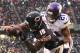 CHICAGO, IL - NOVEMBER 16: Brandon Marshall #15 of the Chicago Bears catches a touchdown pass over Josh Robinson #21 of the Minnesota Vikings during the fourth quarter of a game at Soldier Field on November 16, 2014 in Chicago, Illinois. (Photo by David B