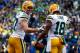 SEATTLE, WA - JANUARY 18: Jordy Nelson #87 celebrates with Randall Cobb #18 of the Green Bay Packers after Cobb catches a 13-yard touchdown in the first quarter during the 2015 NFC Championship game at CenturyLink Field on January 18, 2015 in Seattle, W