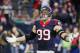 HOUSTON, TX - DECEMBER 28: J.J. Watt #99 of the Houston Texans waits on the field during their game against the Jacksonville Jaguars at NRG Stadium on December 28, 2014 in Houston, Texas. (Photo by Scott Halleran/Getty Images)