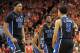 CHARLOTTESVILLE, VA - JANUARY 31: Jahlil Okafor #15, Justise Winslow #12 and Tyus Jones #5 of the Duke Blue Devils celebrate following a late-three pointer by Jones against the Virginia Cavaliers at John Paul Jones Arena on January 31, 2015 in Charlottesv