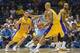 Oct 6, 2014; San Diego, CA, USA; Los Angeles Lakers guard Steve Nash (10) is defended by Denver Nuggets center Timofey Mozgov (25) as he gets the ball from forward Carlos Boozer (5) during the first half at Valley View Casino Center. Mandatory Credit: Ja