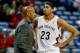 Feb 24, 2014; New Orleans, LA, USA; New Orleans Pelicans head coach Monty Williams talks with power forward Anthony Davis (23) during the fourth quarter at the Smoothie King Center. The Clippers defeated the Pelicans 123-110. Mandatory Credit: Derick E. H