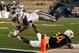 MORGANTOWN, WV - NOVEMBER 20: Tyler Lockett #16 of the Kansas State Wildcats dives for the pylon while a flag is being thrown for a offensive pass interference penalty during the game against Ishmael Banks #34 of the West Virginia Mountaineers on Novembe