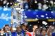 LONDON, ENGLAND - MAY 24: Didier Drogba of Chelsea lifts the trophy after the Barclays Premier League match between Chelsea and Sunderland at Stamford Bridge on May 24, 2015 in London, England. (Photo by Laurence Griffiths/Getty Images)