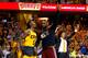 CLEVELAND, OH - MAY 26: J.R. Smith #5, LeBron James #23 and Anderson Varejao #17 of the Cleveland Cavaliers celebrate late in the fourth quarter against the Atlanta Hawks during Game Four of the Eastern Conference Finals of the 2015 NBA Playoffs at Quicke