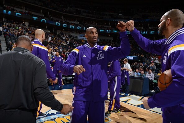 DENVER, CO - DECEMBER 30: Kobe Bryant #24 of the Los Angeles Lakers gets introduced before a game against the Denver Nuggets on December 30, 2014 at the Pepsi Center in Denver, Colorado. NOTE TO USER: User expressly acknowledges and agrees that, by downlo