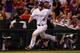 DENVER, CO - JUNE 09: DJ LeMahieu #9 of the Colorado Rockies rounds third to score on a single by Carlos Gonzalez #5 of the Colorado Rockies off of Randy Choate #36 of the St. Louis Cardinals to take a 4-2 lead in the seventh inning at Coors Field on Jun