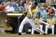 MILWAUKEE, WI - AUGUST 05: Adam Lind #24 of the Milwaukee Brewers hits a single in the first inning against the San Diego Padres at Miller Park on August 05, 2015 in Milwaukee, Wisconsin. (Photo by Mike McGinnis/Getty Images)