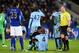 LEICESTER, ENGLAND - DECEMBER 13: Vincent Kompany of Manchester City goes down injured during the Barclays Premier League match between Leicester City and Manchester City at The King Power Stadium on December 13, 2014 in Leicester, England. (Photo by Mi