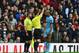 MANCHESTER, ENGLAND - APRIL 12: Vincent Kompany of Manchester City is shown a yellow card by referee Mark Clattenburg during the Barclays Premier League match between Manchester United and Manchester City at Old Trafford on April 12, 2015 in Manchester,