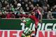 BREMEN, GERMANY - MARCH 14: Jerome Boateng (R) of Munich and Davie Selke (L) of Bremen compete for the ball during the First Bundesliga match between SV Werder Bremen and FC Bayern Muenchen at Weserstadion on March 14, 2015 in Bremen, Germany. (Photo by