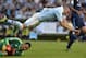 Real Madrid's Costa Rican goalkeeper Keylor Navas (L) stops a ball near Celta Vigo's forward Iago Aspas during the Spanish league football match Celta Vigo vs Real Madrid CF at the Balaidos stadium in Vigo on October 24, 2015. AFP PHOTO / MIGUEL RIOPA