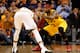 PHOENIX, AZ - JANUARY 13: LeBron James #23 of the Cleveland Cavaliers defends against Marcus Morris #15 of the Phoenix Suns during the NBA game at US Airways Center on January 13, 2015 in Phoenix, Arizona. The Suns defeated the Cavaliers 107-100. NOT
