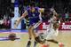 Anadolu Efes Istanbul's Croatian forward Dario Saric (L) vies with Real Madrid's US forward Marcus Slaughter during the Euroleague playoff basketball match Real Madrid vs Anadolu Efes Istambul at the Barclaycard Center in Madrid on April 15, 2015. AFP P