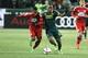 Nov 22, 2015; Portland, OR, USA; FC Dallas midfielder Michael Barrios (21) and Portland Timbers forward/midfielder Darlington Nagbe (6) battle for the ball in the first half of leg one of the Western Conference championship at Providence Park. Mandatory C