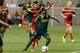 Oct 14, 2015; Sandy, UT, USA; Portland Timbers midfielder Diego Chara (21) jumps in front of Real Salt Lake midfielder Javier Morales (11) to steal the ball during the first half at Rio Tinto Stadium. Mandatory Credit: Chris Nicoll-USA TODAY Sports