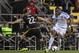 Nov 8, 2015; Columbus, OH, USA; Montreal Impact forward Didier Drogba (11) dribbles the ball while Columbus Crew SC defender Gaston Sauro (22) defends during the extra time in the game at MAPFRE Stadium. Columbus beat Montreal in extra time 4-3 on aggrega